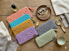 Crochet granny square clutches