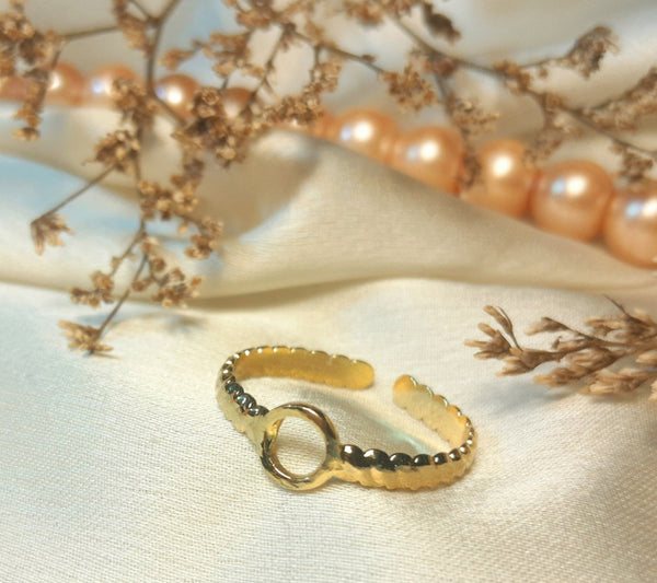 Golden round line ring