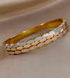 Elegant Stainless Steel Tri Tone Oval Link Bangle