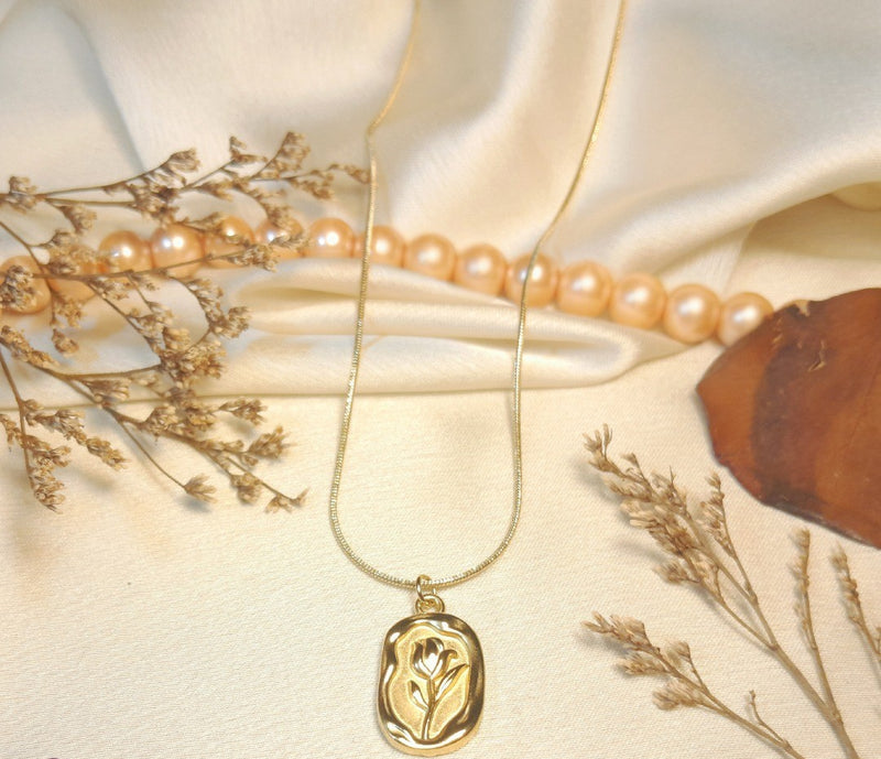 Golden rose pendant