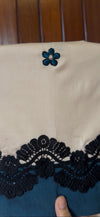 Embroidered teal flowers finished with teal silk panel and cotton lace