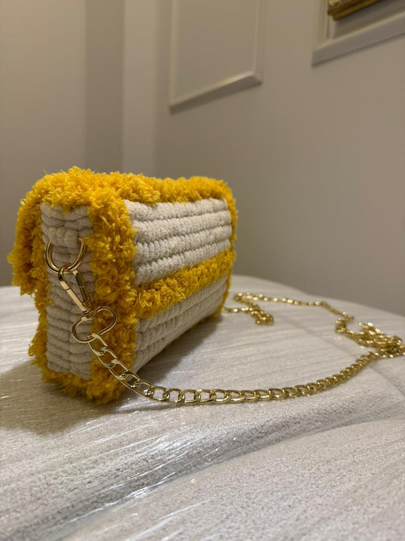 Slit bag woven with fur and wool
