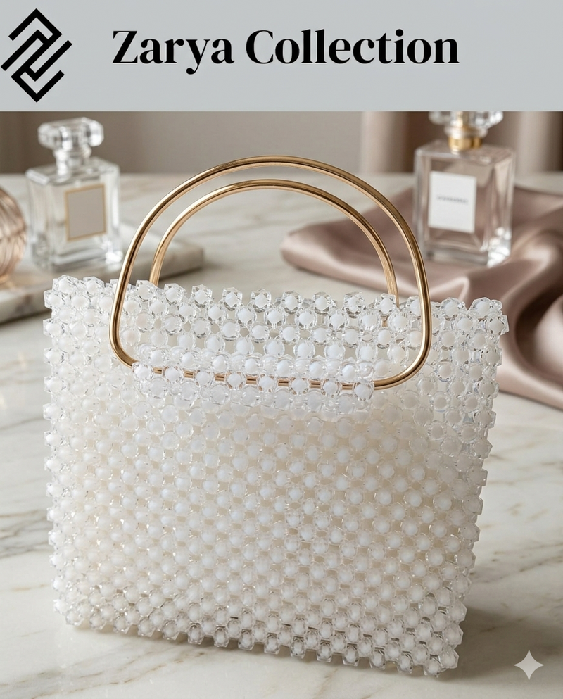 White beaded bag with golden handle