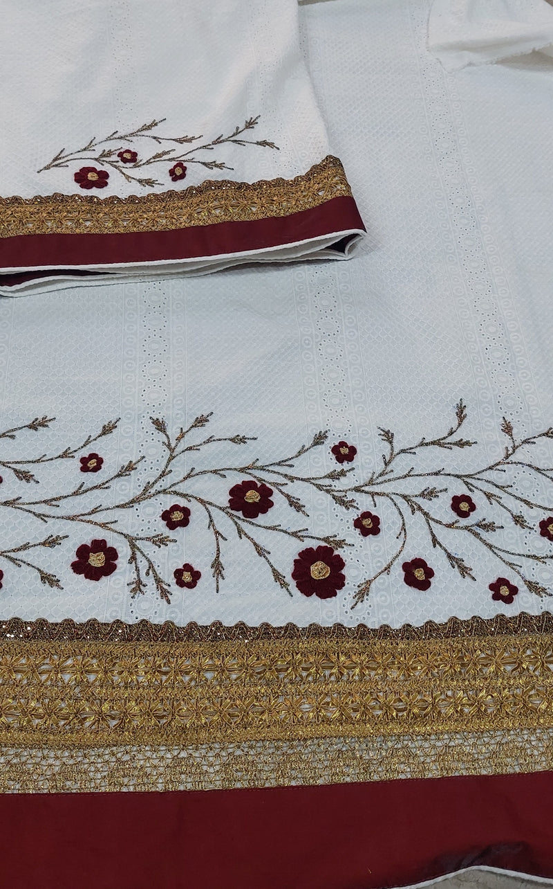 White hakoba rida with gold gotta border and embroidered all over