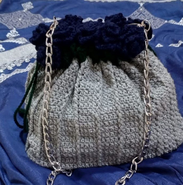 Crocheted rose potli bag