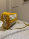 Slit bag woven with fur and wool