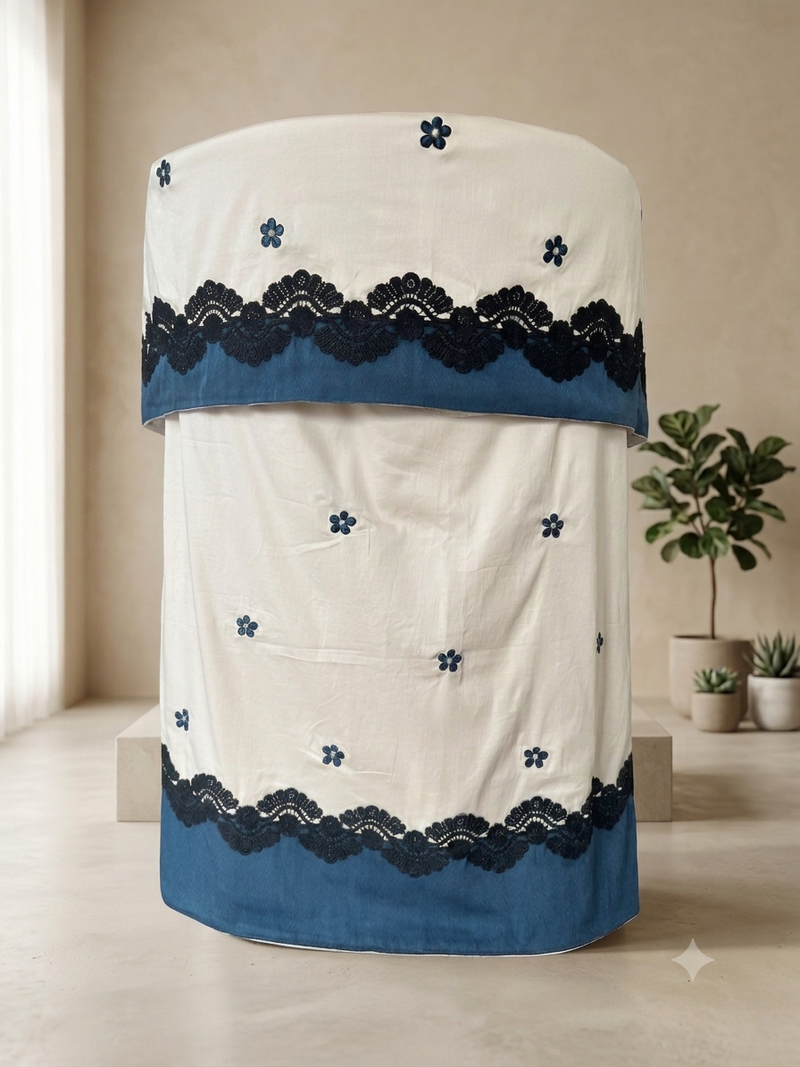 Embroidered teal flowers finished with teal silk panel and cotton lace