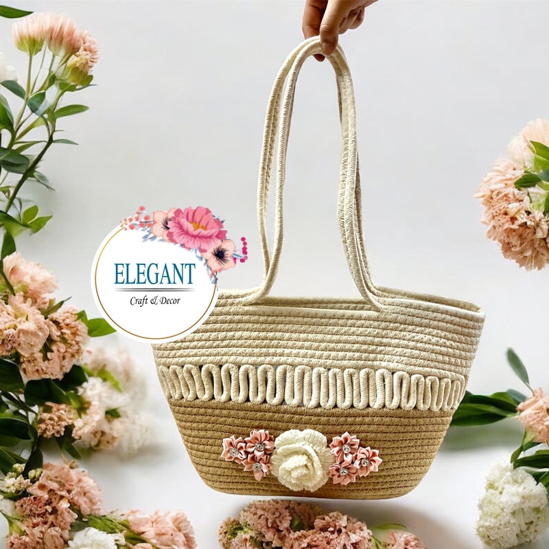 A chic woven straw tote with dual handles, featuring a two-tone design and delicate floral accents—perfect for a stylish, everyday look.
