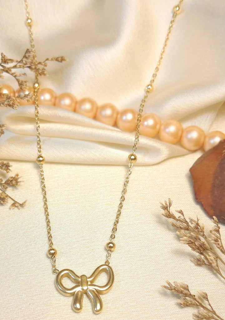 Golden Bow Tie Pendant